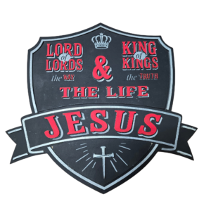 Layered wooden Christian shield sign on a white background featuring “Jesus,” “King of Kings,” and “Lord of Lords” in bold dimensional lettering with detailed faith-inspired accents in the signature bold artsy style of Barefoot Lasers