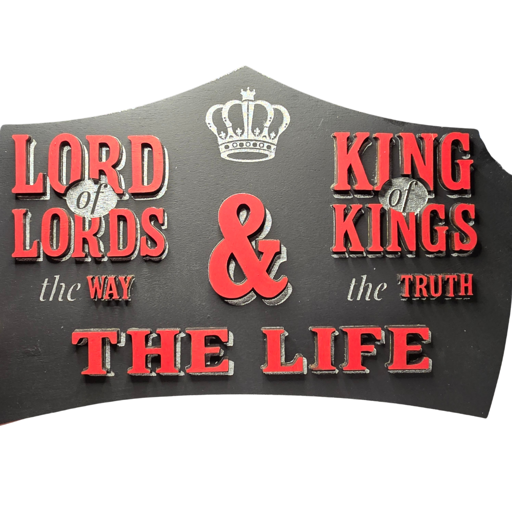 King of Kings Shield Sign featuring layered black, red, and silver details with the names and titles of Jesus: Lord of Lords, King of Kings, The Way, The Truth, and The Life, accented by a crown design.