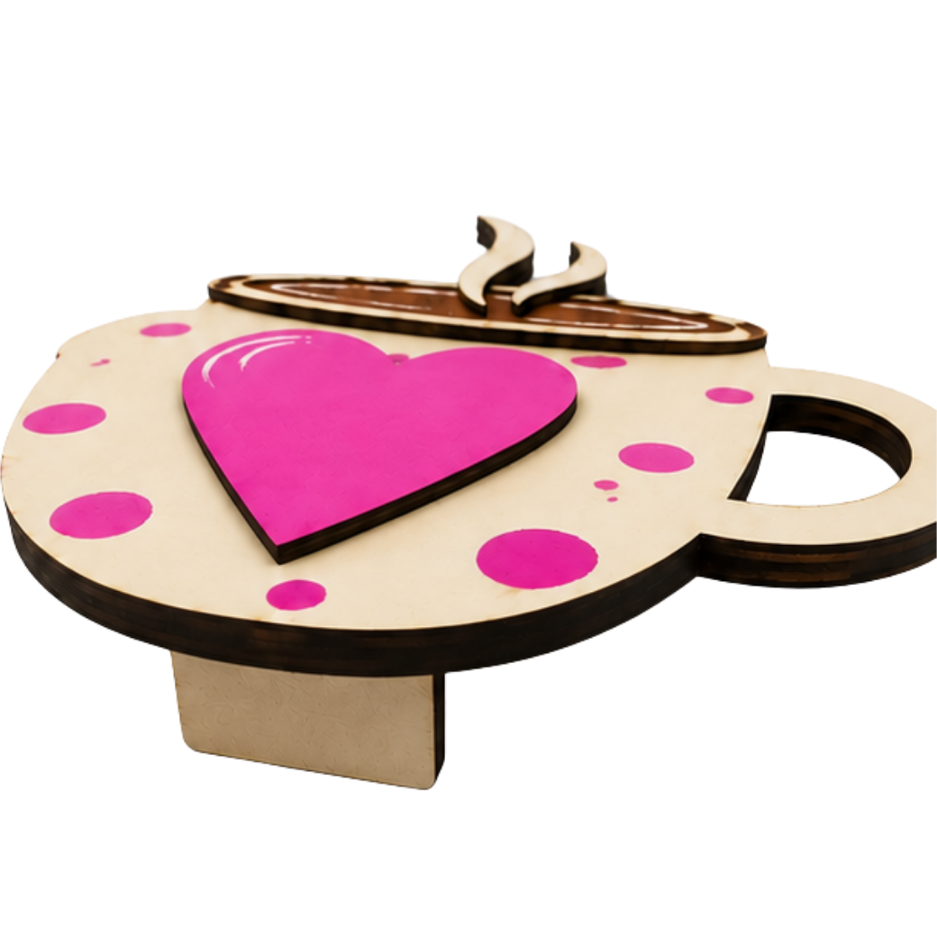 Close-up of the hand-painted pink heart and layered wood details on the Love in Every Cup shelf sitter.