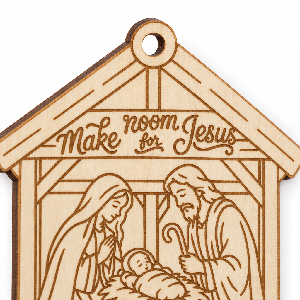 Close-up of the unpainted Make Room for Jesus wooden nativity stable ornament, showing engraved details and natural wood grain.